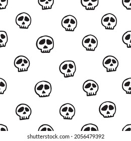 Vector black and white doodle skull polka dots seamless pattern. Hand drawn, lighthearted and funny design ideal for Halloween . Perfect for fabric, wallpaper, scrapbooking and stationery.