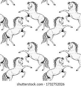 Vector black and white equine seamless pattern with rearing horses in vintage hand drawn style.