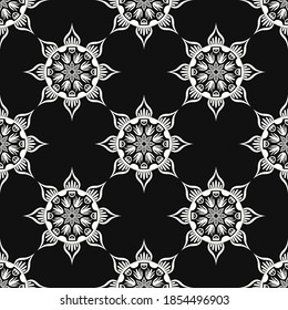 vector black and white ethnic mandala seamless pattern on black