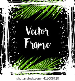 Vector black and white frame with tropical leaves of palm and ink blots