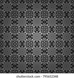 Vector black, white and gray seamless background pattern with rhombuses.