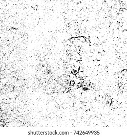 Vector black and white grunge background from stains and cracks