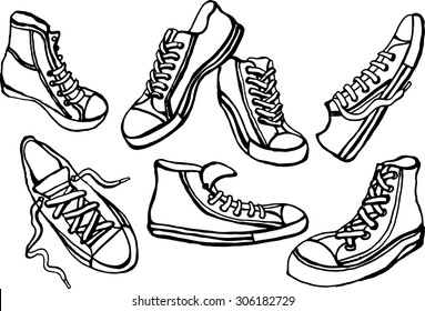 Vector black and white illustration of gym shoes in different angles and positions.