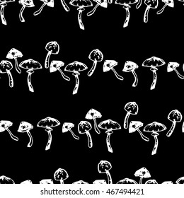 Vector black and white ink seamless pattern with artistically drawn mushrooms. Modern illustration. Can be used for wallpaper, pattern fills, web page, surface textures, textile print, wrapping paper.