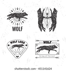 Vector black and white set with forest wolf. The wolf as main element of logotypes on white background. Engraves vector design graphic element, emblem, logo, sign, identity, logotype