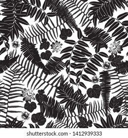 Vector black and white sillouette seamless pattern with ferns, leaves and wild flower. Suitable for textile, gift wrap and wallpaper.