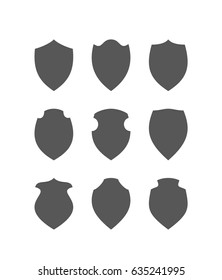 Vector blank medieval frames collection. Set of black empty shields silouettes. Ancient insignia or logo templates. 