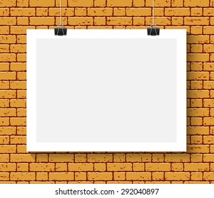 Vector Blank paper poster mock up on orange brick wall. Template of a paper sheet with clips. Paper card hanging on the rop.