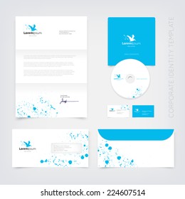 Vector blue business stationary design template with flying pelican silhouette logo and paint splatter. Letter, envelope, cd and business cards. Modern branding collection.