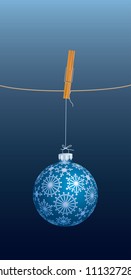 fondo vectorial azul navidad con bola en cuerda