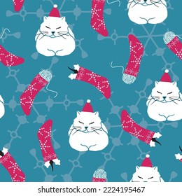 Vector blue Christmas Morning Dreams seamless pattern. Cozy cats among Christmas stockings filled with mice and skeins, in front of transparent snowflakes. Part of Cats Christmas by Last Island Art.
