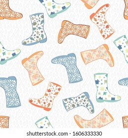Vector Blue, Green, Orange Printed Boots on White Background with Rain Drops Seamless Repeat Pattern. Background for textiles, cards, manufacturing, wallpapers, print, gift wrap and scrapbooking.