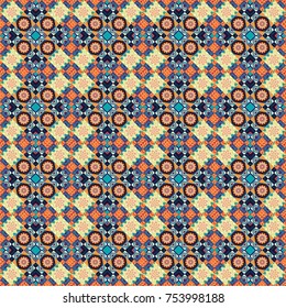 Vector blue, orange and yellow seamless background pattern with rhombuses.