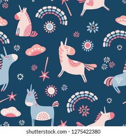 Vector blue and pink unicorns and rainbow seamless repeat pattern background. Perfect for scrapbooking, fabric and stationary projects.