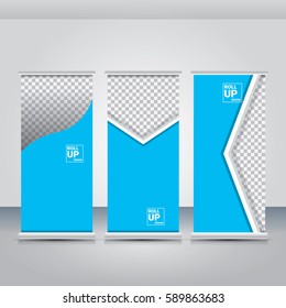 vector blue roll up banner stand design template set with place for photo and text.