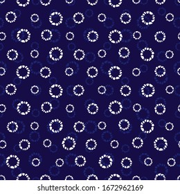 Vector blue shibori simple circle polkadot seamless pattern. Suitable for textile, gift wrap and wallpaper.