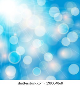 Vector blue sky with a magnificent summer sun burst with lens flare.