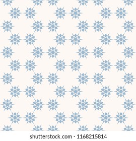 Vector blue snowflakes seamless pattern. Subtle abstract texture with small floral shapes, stars, snow flakes. Simple minimalist winter holiday background. Elegant repeatable design for decor, textile