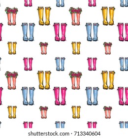 Vector blue, yellow, pink wellies illustration. Seamless pattern in watercolor style. Background for decoration seasonal celebration, fabrics, textile, greeting card and web banner.