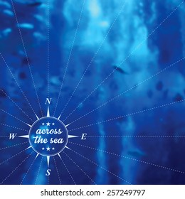 Vector blurred background with deep blue marine landscape and typographical stylized wind rose label