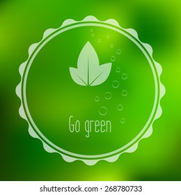 Vector blurred background. Go green hipster badge.