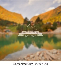 Vector blurred background - mountain lake. Inscription on ribbon: mountains my love