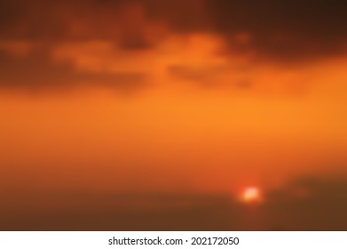 Vector blurred background. Sundown defocused background. Red color