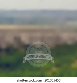 Vector blurred landscape and vintage badge, label on the background of nature view. Web,mobile interface template, website template. Blur backdrop and badge. Ecological and green. 