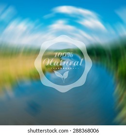 Vector blurred nature background with eco label of Organic Standart Food. Concept. Environmental protection.