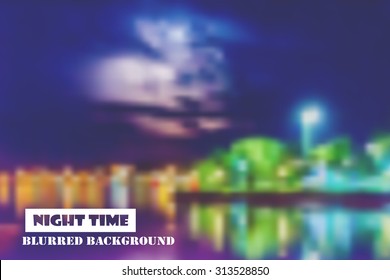 Vector blurred night city background.
