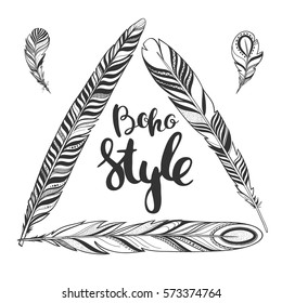 Vector boho frame made of feathers isolated on white. Decorative triangle natural frame with lettering.
