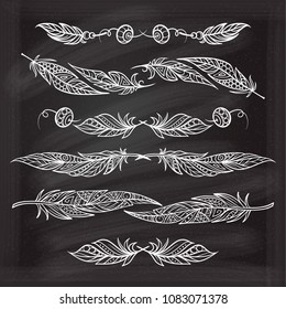 Vector boho style feathers set on a chalkboard background