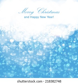 Vector bokeh light blue Christmas background.