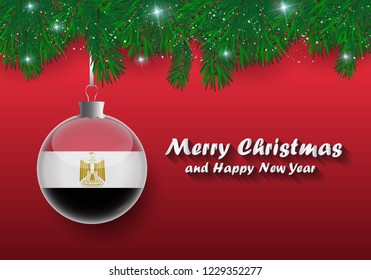 Vector border of Christmas tree branches and ball with egypt flag. Merry christmas and happy new year. 