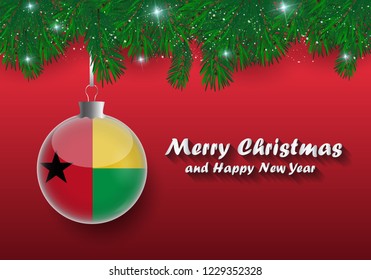 Vector border of Christmas tree branches and ball with guinea bissau flag. Merry christmas and happy new year. 