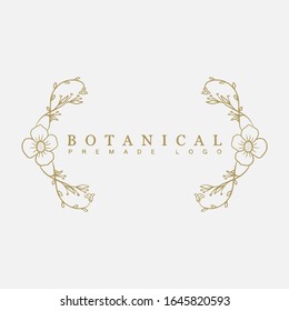 Vector botanical floral hand drawn logo template in elegant and minimal style with gold color on grey background illustration. For badges, labels, logotypes and branding business identity.