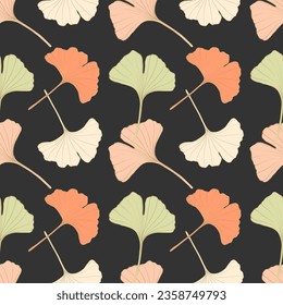 Vector botanical seamless pattern with delicate leaves of Ginkgo biloba on a dark gray background. Pattern for textiles, wrapping paper, wallpaper, covers, backgrounds.