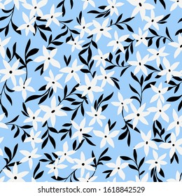 Vector botanical seamless pattern. Small daisies. Glade of wild flowers in vintage style. Flat simple floral freehand background for fashion design, textile, fabric, wallpaper, surface or wrapping.
