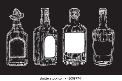 Vector bottles with strong alcohol. Hand drawn whiskey and tequila in bottle. Sketch style