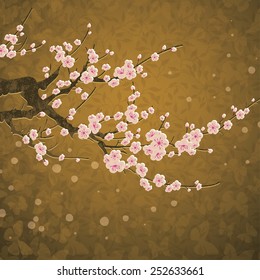 vector branch of cherry blossom over golden background