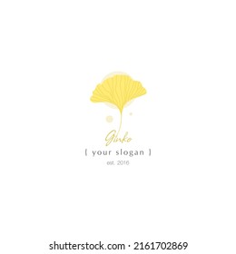 Vector of branding design. Golden Ginkgo biloba leave logo. Luxury floral and natural logo.	