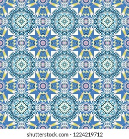 Vector bright ornament of mandalas in yellow, blue and gray colors. Seamless asian ethnic abstract retro doodle background pattern.