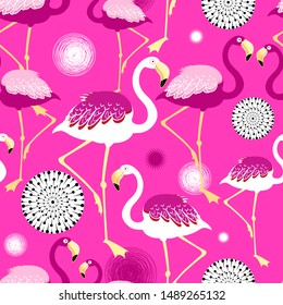 Vector bright seamless flamingo pattern on a pink background. Design for wallpaper or fabric.