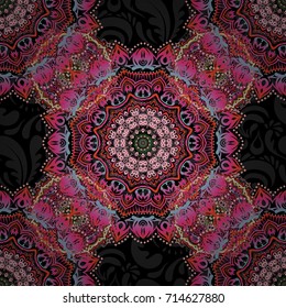 Vector brilliant lace, stylized flowers, paisley. Seamless pattern of beige and yellow textured curls. Oriental style arabesques on a black backdrop. Openwork weaving delicate, abstract background.