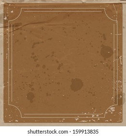 Vector brown paper background with retro frame. Dirty and weathered. Used distressed wrinkled cardboard. Craft paper. Vintage style. 