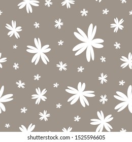 Vector brown and white flowers seamless pattern background.  Ideal for fabric, scrapbooking, wallpaper, gift wrap and much more.