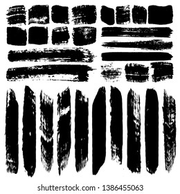 Vector brush set. Collection of smears and stains. Black lines and blots on white background