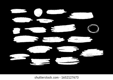 Vector brush strokes on black background set of grunge artistic brush strokes. Empty white backgrounds, frames for text or quote.
