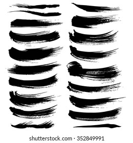 Vector brush strokes textured thick black paint set isolated on a white background