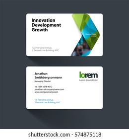 Vector business card template with green arrows, triangles for eco, business, tech. Simple and clean design. Creative corporate identity layout set with effects.